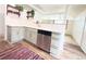 Bright kitchen featuring stainless steel appliances, white countertops and warm wood accents at 3355 Moorhead Ave, Boulder, CO 80305