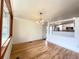 Inviting living room with large windows, hardwood floors, and natural light at 3355 Moorhead Ave, Boulder, CO 80305