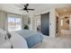 Relaxing bedroom with access to a private outdoor balcony and an ensuite bathroom at 629 Jackson St, Lafayette, CO 80026