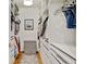 Walk-in closet with custom shelving, drawers, and hanging rods at 629 Jackson St, Lafayette, CO 80026