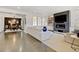 Spacious living room with a fireplace, large windows for plenty of light, and an adjacent dining area at 629 Jackson St, Lafayette, CO 80026