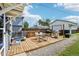 Lovely backyard with a wooden deck, complete with a grill and a small trampoline, great for Gathering fun at 130 N 8Th Ave, Brighton, CO 80601