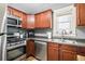 Well-equipped kitchen featuring stainless steel appliances, ample cabinet space, and a convenient double sink at 130 N 8Th Ave, Brighton, CO 80601