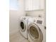 Bright laundry room with modern washer and dryer units at 2685 S Acoma St, Denver, CO 80223