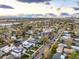 Aerial view of a vibrant neighborhood with tree-lined streets and diverse architectural styles at 2685 S Acoma St, Denver, CO 80223