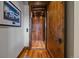 Interior view of a private home elevator showcasing wood paneling and flooring at 34650 Sleeping Fox Trl, Evergreen, CO 80439