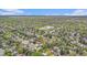 Expansive aerial view of a neighborhood with mature trees and community spaces at 4740 Lee Cir, Boulder, CO 80303