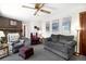 Comfortable living room offers plush seating, a brick fireplace, and a warm ambiance for relaxation and gatherings at 4740 Lee Cir, Boulder, CO 80303