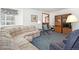 Spacious living area with comfortable seating, a large window, and traditional furnishings for a cozy atmosphere at 4740 Lee Cir, Boulder, CO 80303