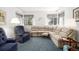 Inviting living room showcasing plush seating, large windows, and a cozy ambiance for relaxation and entertainment at 4740 Lee Cir, Boulder, CO 80303