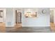 Open floor plan view of kitchen with modern appliances from living room at 9700 E Iliff Ave # A3, Denver, CO 80231