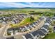 Expansive aerial view of a residential community nestled amidst rolling hills at 52 Simmental Loop, Castle Rock, CO 80104