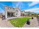 Backyard featuring a well-maintained lawn and fence, ideal for outdoor activities and privacy at 52 Simmental Loop, Castle Rock, CO 80104