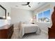 Bright bedroom with a large window and neutral decor, creating a serene and inviting space at 52 Simmental Loop, Castle Rock, CO 80104