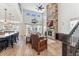 Bright living room featuring soaring ceilings and a floor-to-ceiling stone fireplace at 52 Simmental Loop, Castle Rock, CO 80104
