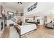 Open-concept living space with soaring ceilings, fireplace, staircase, kitchen, and dining area at 52 Simmental Loop, Castle Rock, CO 80104