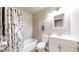 Bright bathroom with a shower-tub combo and a modern vanity at 821 Clarkson Ct, Denver, CO 80229