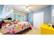 This bedroom features a window and large closet for maximum storage space at 821 Clarkson Ct, Denver, CO 80229