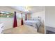 Calm and well-lit bedroom with a TV and a ceiling fan at 821 Clarkson Ct, Denver, CO 80229