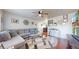 Spacious living room with hardwood floors and a neutral color palette at 821 Clarkson Ct, Denver, CO 80229