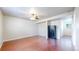 Spacious living room featuring hardwood floors, recessed lighting, and a security safe at 821 Clarkson Ct, Denver, CO 80229