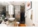 Modern bathroom with unique tile, vessel sink, glass block window and updated fixtures at 1555 California St # 609, Denver, CO 80202