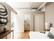 A bright bedroom showcases a walk-in closet and an additional storage area at 1555 California St # 609, Denver, CO 80202