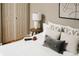 Bright and well-appointed bedroom offers natural light and a closet for storage at 1555 California St # 609, Denver, CO 80202