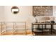 Decorated console table with plants and a large piece of art in a modern styled home at 1555 California St # 609, Denver, CO 80202