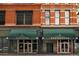 Exterior view of the building with office and residential entrances in the city at 1555 California St # 609, Denver, CO 80202