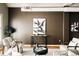 Sitting area showcasing modern wall art and an industrial style ceiling with exposed ductwork at 1555 California St # 609, Denver, CO 80202