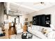 Open-concept living space features a comfortable seating area and flows seamlessly to the modern kitchen at 1555 California St # 609, Denver, CO 80202