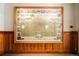 Framed antique map of Denver, Colorado from 1908 on wood paneled wall at 1555 California St # 609, Denver, CO 80202
