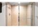 Contemporary tiled shower featuring glass enclosure and chrome fixtures at 23427 Song Bird Hills Pl, Parker, CO 80138