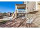 Spacious stamped concrete patio with upper deck overlooking the level backyard and community at 15310 E 108Th Way, Commerce City, CO 80022