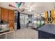 Spacious bedroom with built-in cabinets, sports decorations, and bunk beds at 15310 E 108Th Way, Commerce City, CO 80022