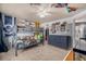 Bright bedroom with sports-themed decor, bunk beds, and a gray dresser, creating a playful atmosphere at 15310 E 108Th Way, Commerce City, CO 80022