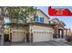 Inviting two-story home features a three-car garage, stone accents, neutral siding, and well-maintained landscaping at 15310 E 108Th Way, Commerce City, CO 80022