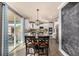 Bright eat-in kitchen with stainless steel appliances, white cabinets, and granite countertops at 15310 E 108Th Way, Commerce City, CO 80022