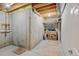 Unfinished basement space with concrete walls, exposed ceiling, and visible plumbing at 1864 Malibu Ct, Fort Lupton, CO 80621