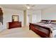 The main bedroom includes large windows and plenty of room for dressers and furniture at 1864 Malibu Ct, Fort Lupton, CO 80621