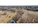 Aerial view of the neighborhood park and trails near residential homes. Playground included at 1071 Oak Cir, Lakewood, CO 80215