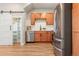 Well-organized kitchen featuring stainless steel appliances, light wood cabinets, and convenient access to pantry at 1071 Oak Cir, Lakewood, CO 80215