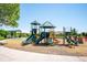 A playground with slides and climbing structures, perfect for Gathering fun in the sun at 5721 S Jellison St, Littleton, CO 80123