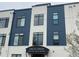 Stylish modern building with a covered entryway and signage reading 'Logan Lofts' at 336 E 1St Ave # 310, Denver, CO 80203