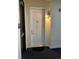 Apartment door with modern hardware, good lighting and dark mat, providing a welcoming entrance at 336 E 1St Ave # 310, Denver, CO 80203