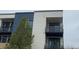 Modern apartment building exterior with private balconies at 336 E 1St Ave # 310, Denver, CO 80203