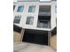 View of underground garage with black roller door, providing secure parking for the building residents at 336 E 1St Ave # 310, Denver, CO 80203
