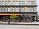 Exterior view of a restaurant with outdoor seating and vibrant storefront at 336 E 1St Ave # 310, Denver, CO 80203
