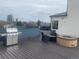 Spacious deck features a firepit, barbecue and outdoor seating area at 336 E 1St Ave # 310, Denver, CO 80203